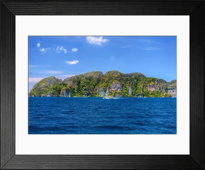 Framed Print : Motor ship in the bay of Ko Phi Phi Don Island with huge rocks and cliffs on a sunny day Framed Print : Motor ship in the bay of Ko Phi Phi Don Island with huge rocks and cliffs on a sunny day