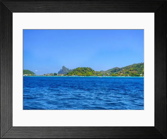 Framed Print : Motor ship in the bay of Ko Phi Phi Don Island with huge rocks and cliffs on a sunny day Framed Print : Motor ship in the bay of Ko Phi Phi Don Island with huge rocks and cliffs on a sunny day
