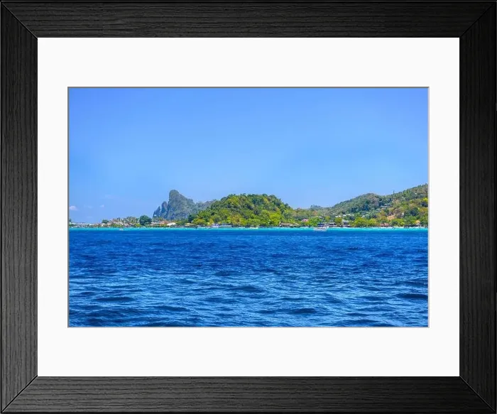 Framed Print : Motor ship in the bay of Ko Phi Phi Don Island with huge rocks and cliffs on a sunny day Framed Print : Motor ship in the bay of Ko Phi Phi Don Island with huge rocks and cliffs on a sunny day