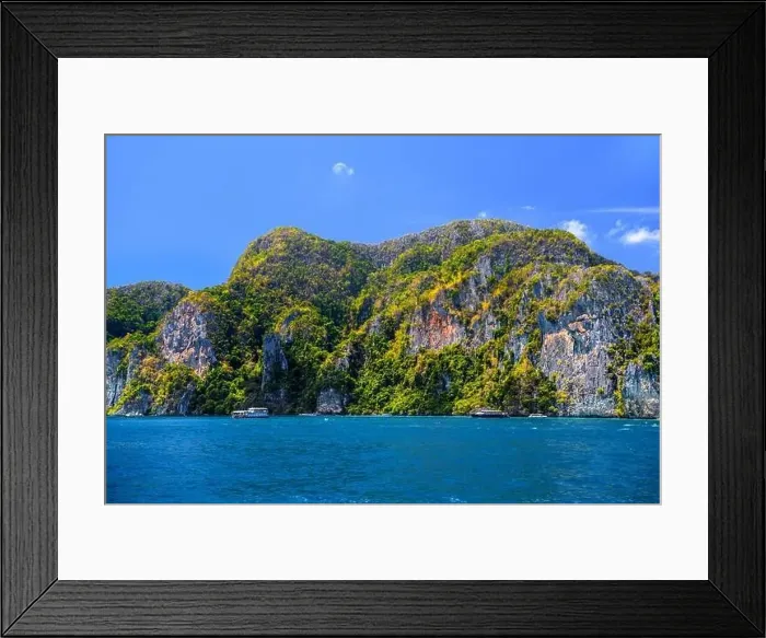 Framed Print : Motor ship in the bay of Ko Phi Phi Don Island with huge rocks and cliffs on a sunny day Framed Print : Motor ship in the bay of Ko Phi Phi Don Island with huge rocks and cliffs on a sunny day