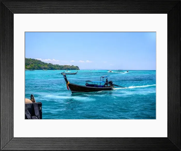 Framed Print : Motor ship in the bay of Ko Phi Phi Don Island with huge rocks and cliffs on a sunny day Framed Print : Motor ship in the bay of Ko Phi Phi Don Island with huge rocks and cliffs on a sunny day