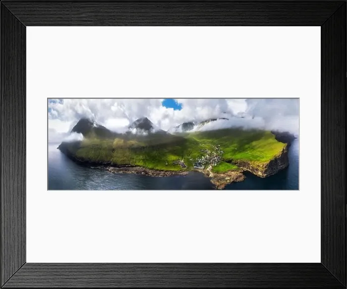 Framed Print : Faroe islands - Aerial panoramic view of the village of gjogv on cliffs washed by the ocean Framed Print : Faroe islands - Aerial panoramic view of the village of gjogv on cliffs washed by the ocean