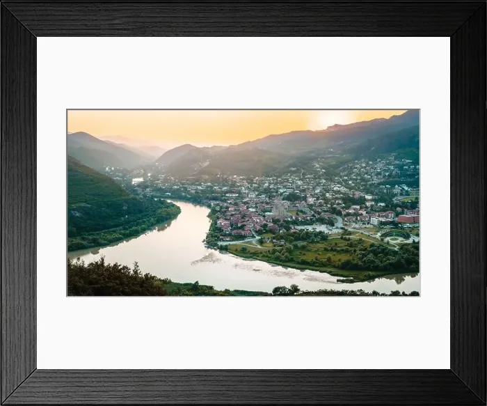 Framed Print : Aerial wide view historical former Georgia capital Mtskheta city with valley and river background Framed Print : Aerial wide view historical former Georgia capital Mtskheta city with valley and river background