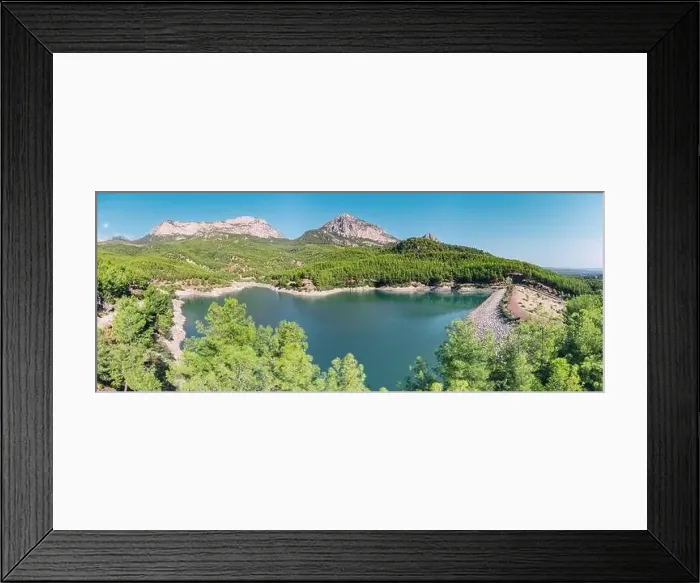Framed Print : Aerial view of the reservoir pond with beautiful bluish green water among the mountains Framed Print : Aerial view of the reservoir pond with beautiful bluish green water among the mountains