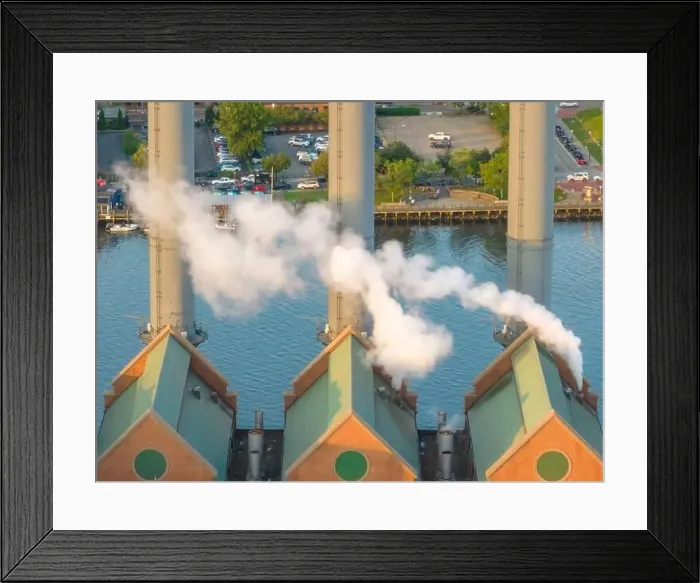 Framed Print : Late afternoon summer aerial image of the power plant located downtown Providence RI, USA Framed Print : Late afternoon summer aerial image of the power plant located downtown Providence RI, USA