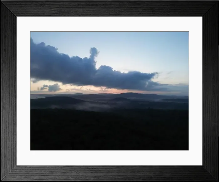Framed Print : Drone picture of a foggy valley with rolling hills during sunset Framed Print : Drone picture of a foggy valley with rolling hills during sunset