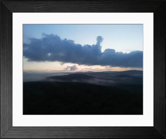 Framed Print : Drone picture of a foggy valley with rolling hills during sunset Framed Print : Drone picture of a foggy valley with rolling hills during sunset