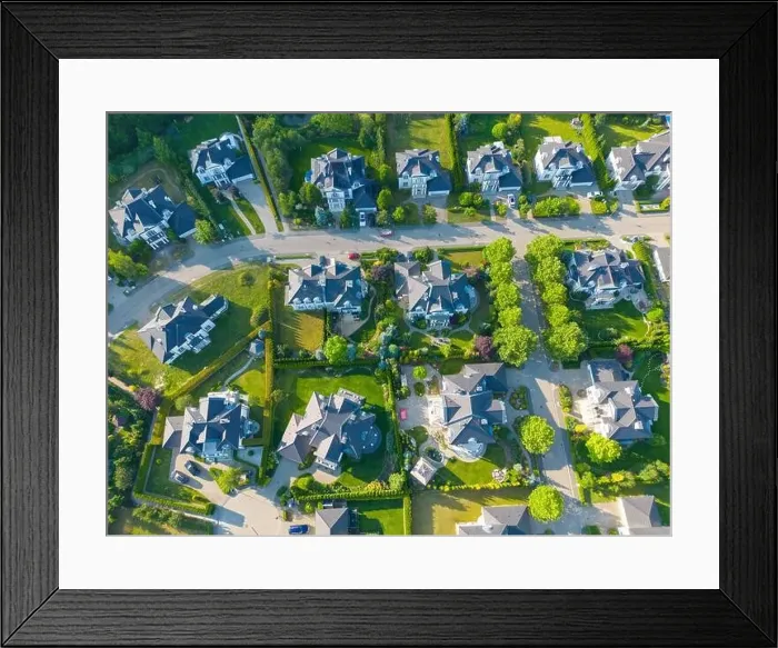 Framed Print : Aerial of new construction luxury residential neighborhood street single family homes real estate Framed Print : Aerial of new construction luxury residential neighborhood street single family homes real estate