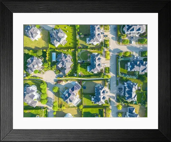 Framed Print : Aerial of new construction luxury residential neighborhood street single family homes real estate Framed Print : Aerial of new construction luxury residential neighborhood street single family homes real estate