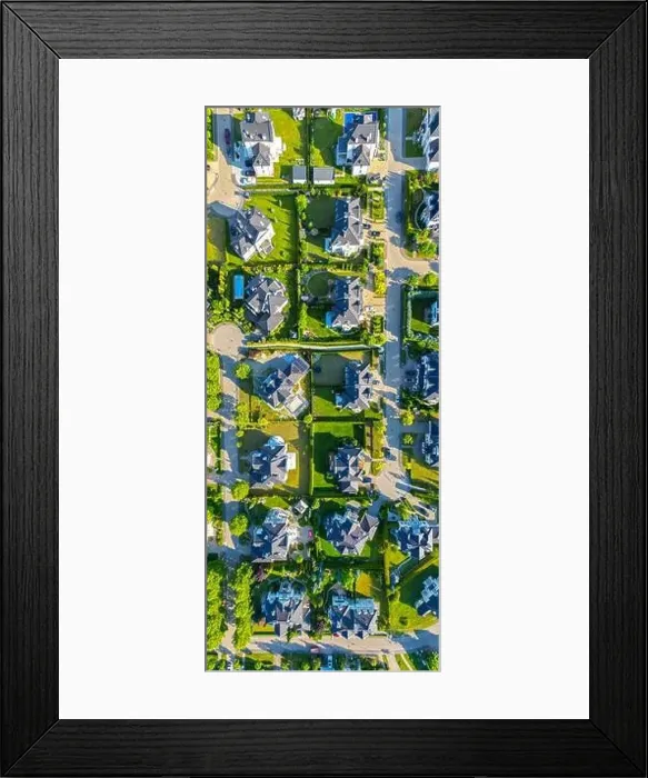 Framed Print : Aerial of new construction luxury residential neighborhood street single family homes real estate Framed Print : Aerial of new construction luxury residential neighborhood street single family homes real estate