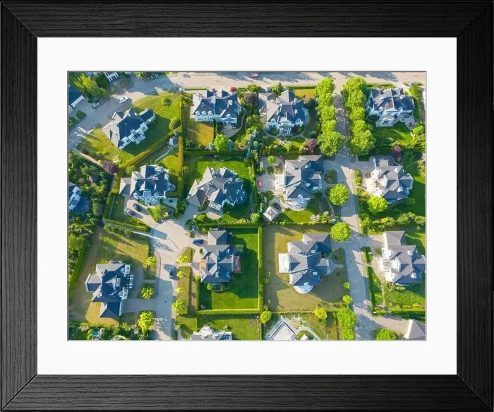Framed Print : Aerial of new construction luxury residential neighborhood street single family homes real estate Framed Print : Aerial of new construction luxury residential neighborhood street single family homes real estate
