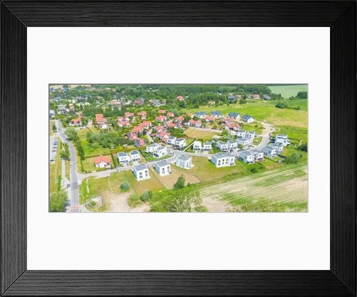 Framed Print : Aerial of new construction luxury residential neighborhood street single family homes real estate Framed Print : Aerial of new construction luxury residential neighborhood street single family homes real estate