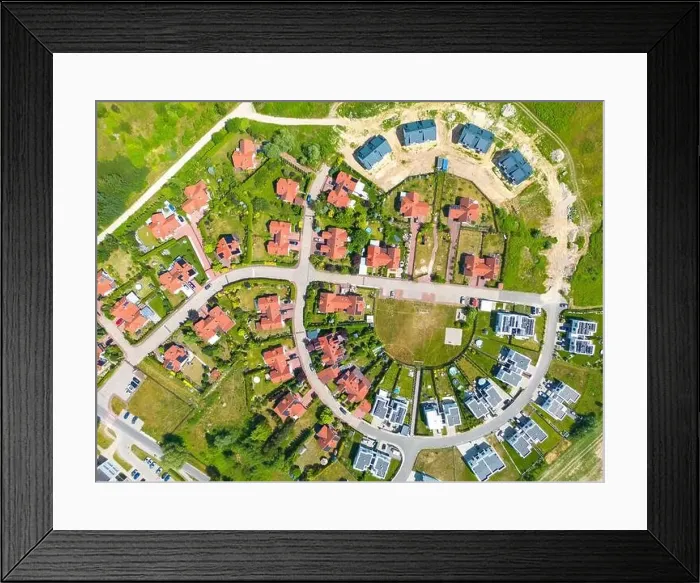 Framed Print : Aerial of new construction luxury residential neighborhood street single family homes real estate Framed Print : Aerial of new construction luxury residential neighborhood street single family homes real estate