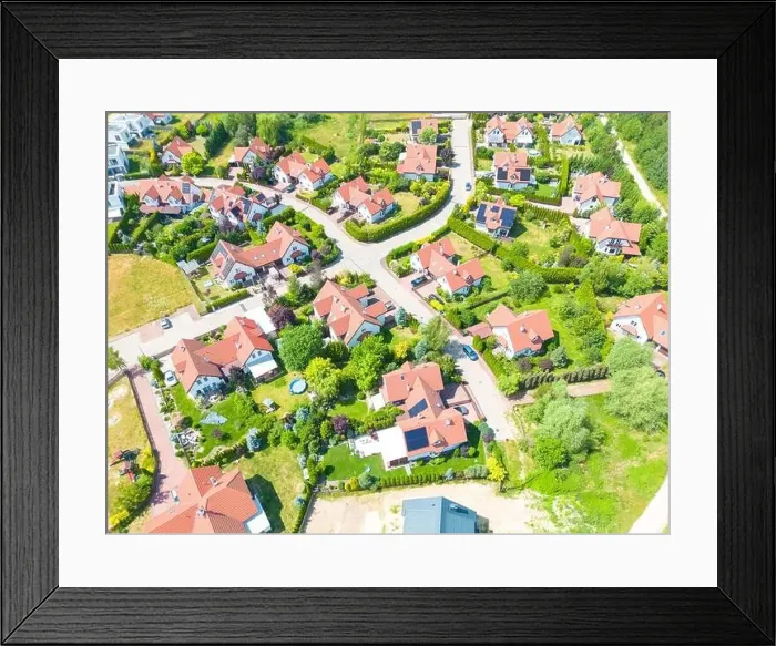 Framed Print : Aerial of new construction luxury residential neighborhood street single family homes real estate Framed Print : Aerial of new construction luxury residential neighborhood street single family homes real estate
