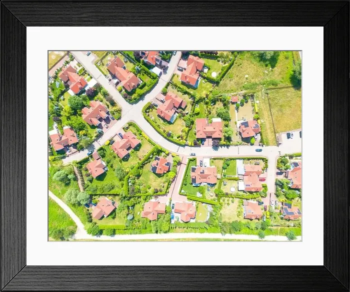 Framed Print : Aerial of new construction luxury residential neighborhood street single family homes real estate Framed Print : Aerial of new construction luxury residential neighborhood street single family homes real estate