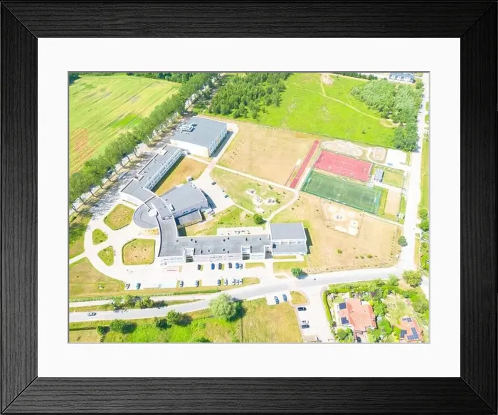 Framed Print : Aerial of new construction luxury residential neighborhood street single family homes real estate