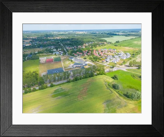 Framed Print : Aerial of new construction luxury residential neighborhood street single family homes real estate Framed Print : Aerial of new construction luxury residential neighborhood street single family homes real estate