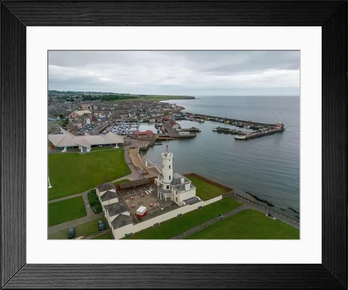 Framed Print : Aerial drone photo of the signal tower and harbour in Arbroath. Arbroath is a harbour town in Aberdeenshire, Scotland Framed Print : Aerial drone photo of the signal tower and harbour in Arbroath. Arbroath is a harbour town in Aberdeenshire, Scotland