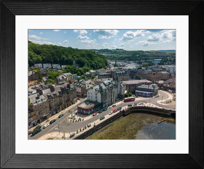Framed Print : Aerial drone photo of the town centre in Oban. Oban is a coastal town in Scotland Framed Print : Aerial drone photo of the town centre in Oban. Oban is a coastal town in Scotland