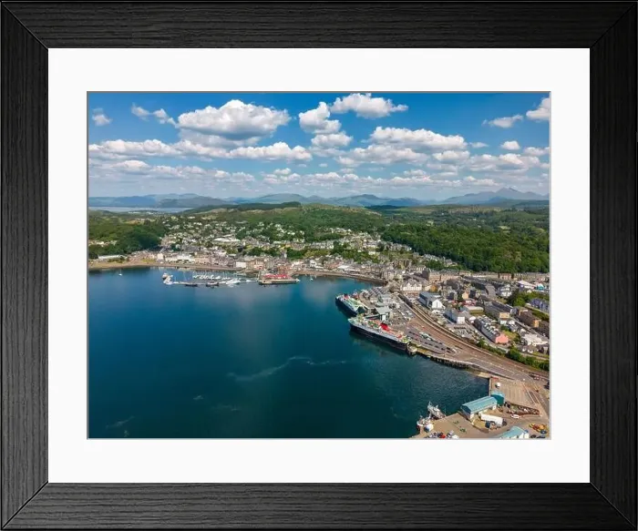 Framed Print : Aerial drone photo of the harbour town Oban in Scotland. It has a large ferry port and an old town centre at the bay