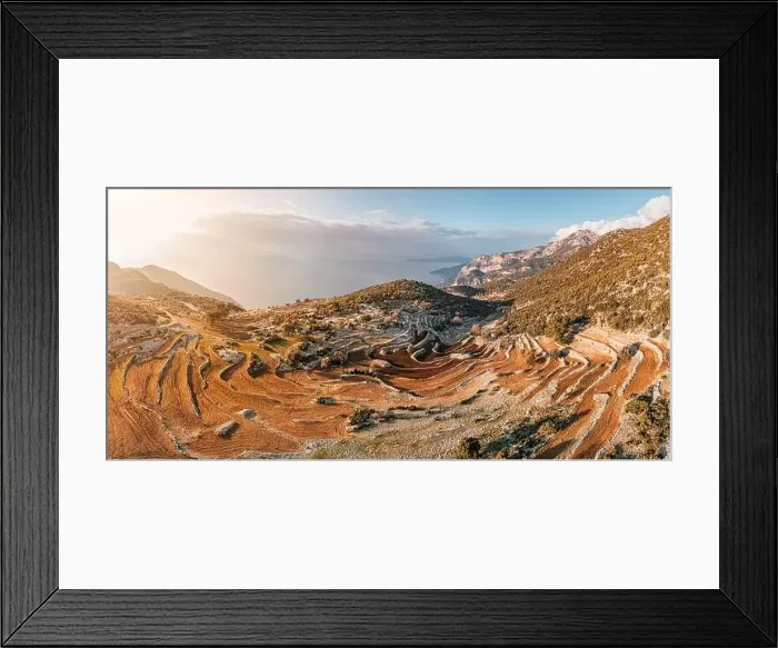 Framed Print : An aerial view captures the striking beauty of a plowed field with terraces on the hills Framed Print : An aerial view captures the striking beauty of a plowed field with terraces on the hills