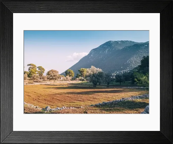 Framed Print : plowed field with terraces on the hills, surrounded by mountains Framed Print : plowed field with terraces on the hills, surrounded by mountains