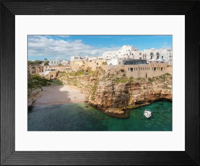 Framed Print : View of beach and old town on limestone cliffs, Polignano a Mare, Puglia, Italy, Europe Framed Print : View of beach and old town on limestone cliffs, Polignano a Mare, Puglia, Italy, Europe