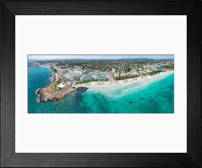 Framed Print : Panoramic aerial view of Sa Coma beach in Mallorca Spain on a summer day Framed Print : Panoramic aerial view of Sa Coma beach in Mallorca Spain on a summer day