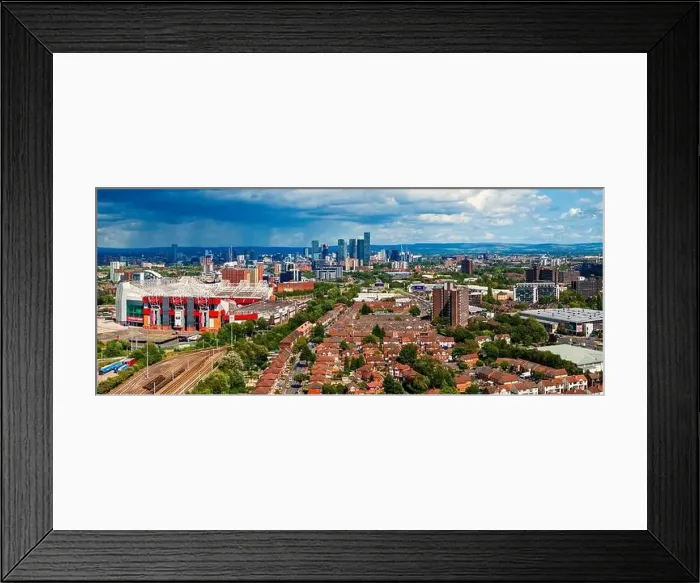 Framed Print : Manchester United football ground with the city skyline on the background Framed Print : Manchester United football ground with the city skyline on the background