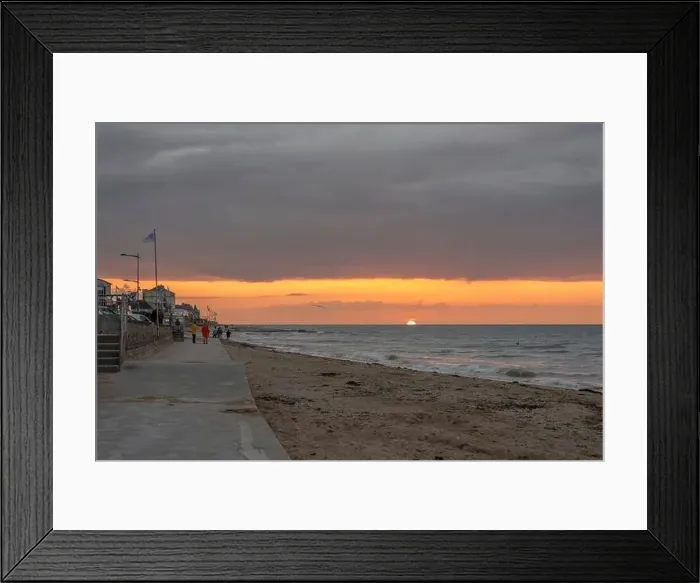 Framed Print : View of the sea and the jetty from the beach at sunset Framed Print : View of the sea and the jetty from the beach at sunset