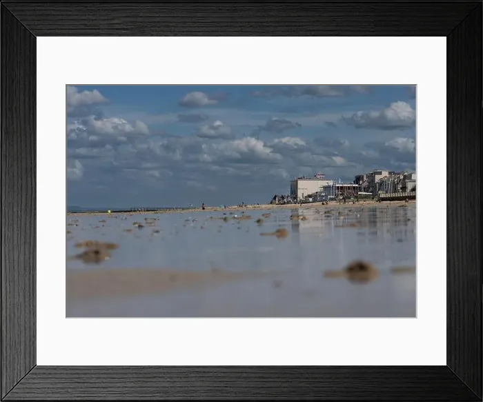 Framed Print : Luc-Sur-Mer, France - 07 16 20231: View of the sea and the jetty reflecting on the water from the beach at sunset Framed Print : Luc-Sur-Mer, France - 07 16 20231: View of the sea and the jetty reflecting on the water from the beach at sunset