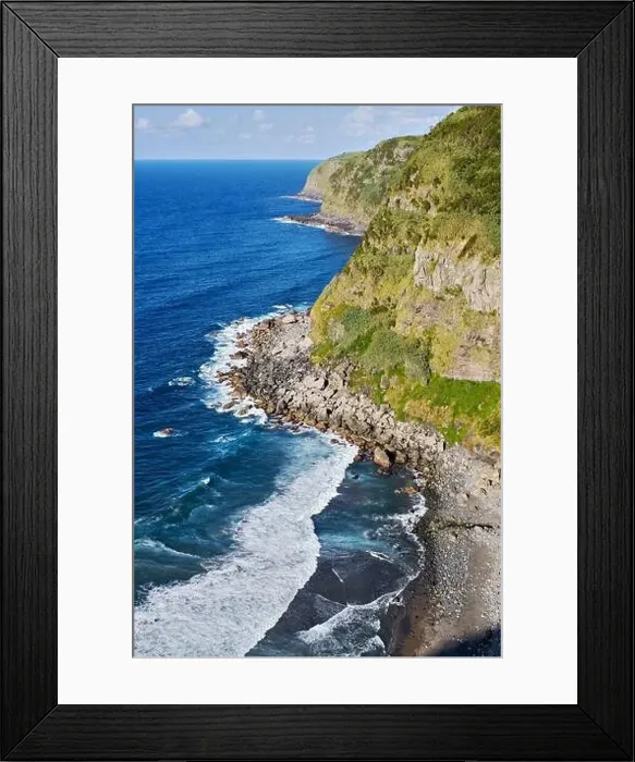 Framed Print : Aerial shot drone point of view green hills and Atlantic Ocean surf during sunny summer day Framed Print : Aerial shot drone point of view green hills and Atlantic Ocean surf during sunny summer day