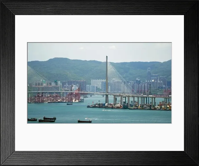 Framed Print : Kwai Tsing container terminal port view in drone, and hong kong skyline and stonecutter's bridge Framed Print : Kwai Tsing container terminal port view in drone, and hong kong skyline and stonecutter's bridge