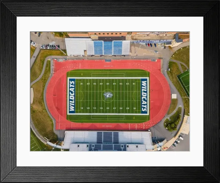 Framed Print : Wildcat Stadium top view of University of New Hampshire UNH Durham campus on Main Street in historic town center of Framed Print : Wildcat Stadium top view of University of New Hampshire UNH Durham campus on Main Street in historic town center of
