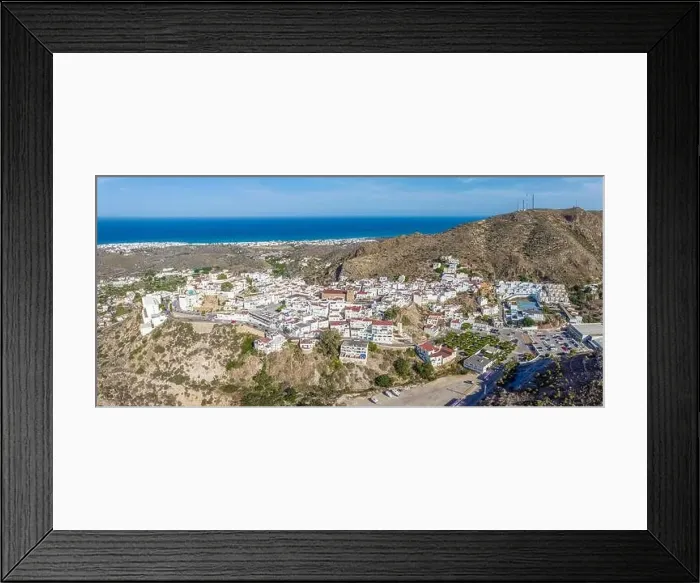 Framed Print : Picturesque spanish hillside white washed village of Mojacar during sunny day against blue sky Framed Print : Picturesque spanish hillside white washed village of Mojacar during sunny day against blue sky