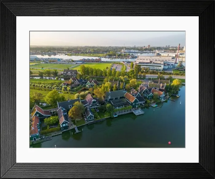 Framed Print : Aerial drone photo of the Zaanse Schans. This picture shows a typical dutch village next to a river Framed Print : Aerial drone photo of the Zaanse Schans. This picture shows a typical dutch village next to a river