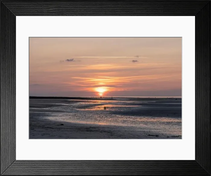 Framed Print : Langrune-Sur-Mer, France - 07 21 2023: View a man and a woman looking at the sunset on the beach Framed Print : Langrune-Sur-Mer, France - 07 21 2023: View a man and a woman looking at the sunset on the beach