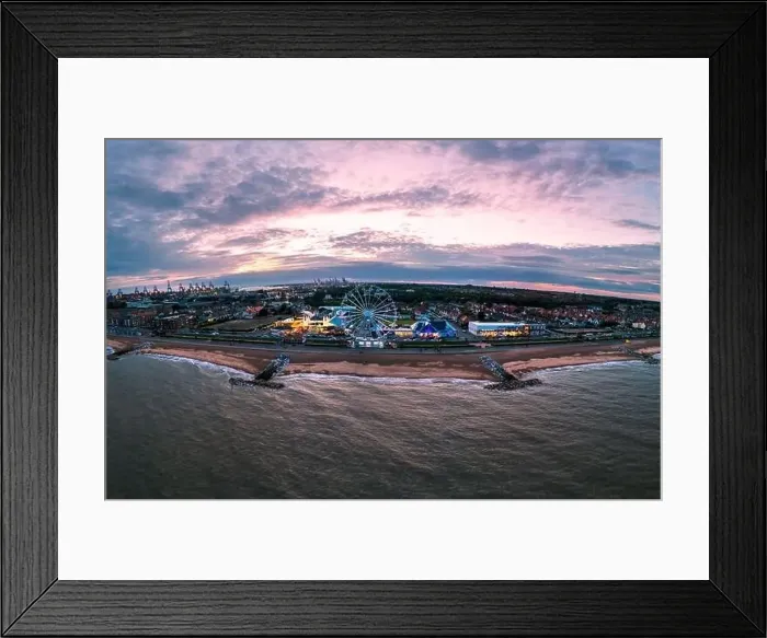 Framed Print : The seafront and Ferris wheel at dusk in Felixstowe, Suffolk, UK Framed Print : The seafront and Ferris wheel at dusk in Felixstowe, Suffolk, UK