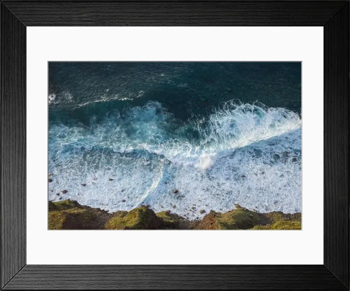 Framed Print : Great waves in the Atlantic Ocean that are illuminated by the sun and therefore shine so beautifully