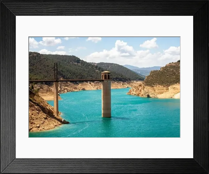 Framed Print : Drone view of Francisco Abellán Reservoir bridge above blue water on sunny day located in La Peza in Spain Framed Print : Drone view of Francisco Abellán Reservoir bridge above blue water on sunny day located in La Peza in Spain