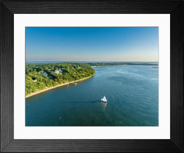 Framed Print : aerial view of homes on Shelter Heights water front homes and a sailboat Framed Print : aerial view of homes on Shelter Heights water front homes and a sailboat