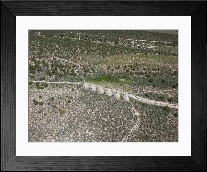 Framed Print : Aerial perspective of the behave shaped charcoal ovens that were used from 1876 to 1897 to make charcoal out of trees Framed Print : Aerial perspective of the behave shaped charcoal ovens that were used from 1876 to 1897 to make charcoal out of trees