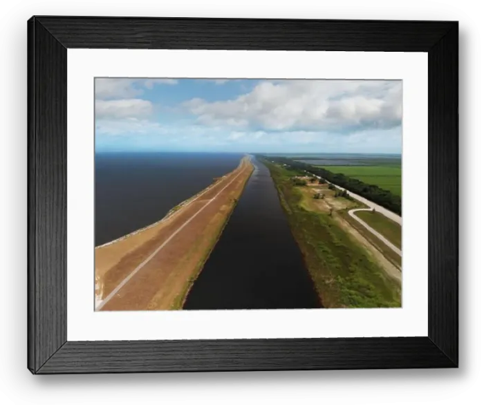Framed Print : Lake Okeechobee scenic trail, canal and country road. Aerial view Framed Print : Lake Okeechobee scenic trail, canal and country road. Aerial view