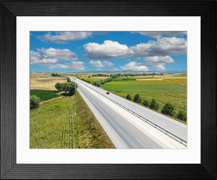 Framed Print : Aerial view of cars and transport trucks on Highway with fields on both sides Framed Print : Aerial view of cars and transport trucks on Highway with fields on both sides