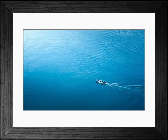 Framed Print : Top view, aerial view wooden fishing boat on the beach from a drone Framed Print : Top view, aerial view wooden fishing boat on the beach from a drone