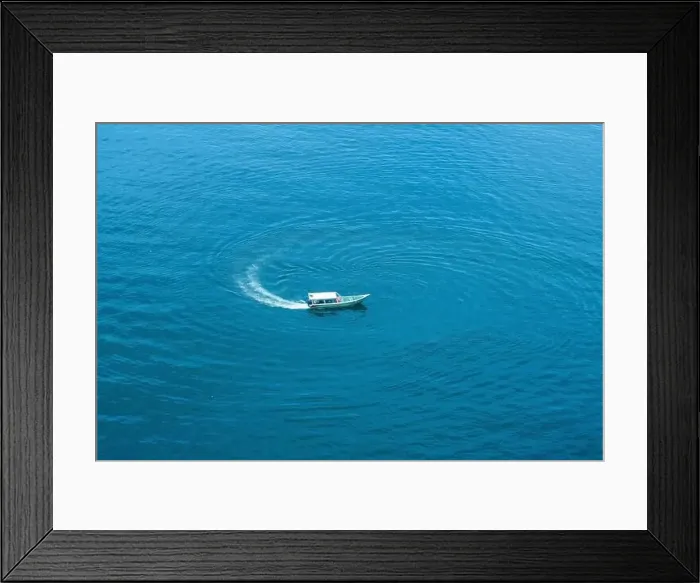 Framed Print : Top view, aerial view wooden fishing boat on the beach from a drone Framed Print : Top view, aerial view wooden fishing boat on the beach from a drone
