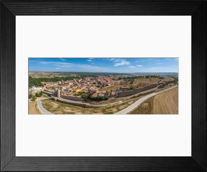 Framed Print : Aerial view of Almazan city walls, fortified gate, battlements above the Ebro river in Spain with cloudy blue sky Framed Print : Aerial view of Almazan city walls, fortified gate, battlements above the Ebro river in Spain with cloudy blue sky