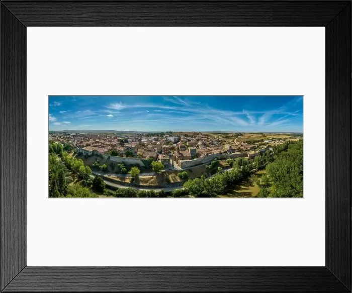 Framed Print : Aerial view of Almazan city walls, fortified gate, battlements above the Ebro river in Spain with cloudy blue sky Framed Print : Aerial view of Almazan city walls, fortified gate, battlements above the Ebro river in Spain with cloudy blue sky