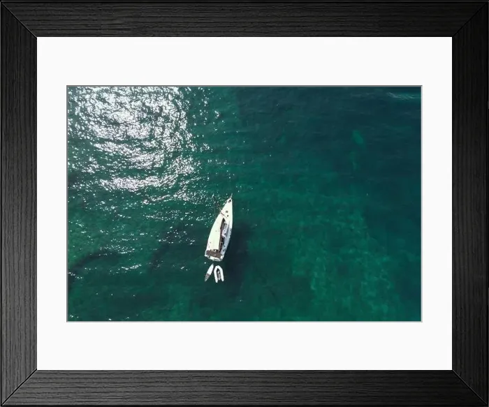 Framed Print : A single Yacht moored off Plage de l'Estagnol in the Var department Framed Print : A single Yacht moored off Plage de l'Estagnol in the Var department