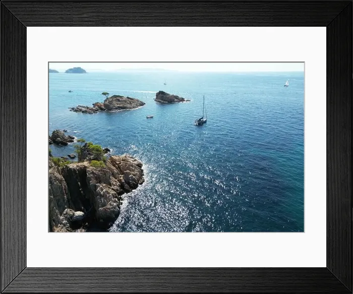 Framed Print : A Yacht moored in the turquoise Mediterranean sea off the coast of The South of France Framed Print : A Yacht moored in the turquoise Mediterranean sea off the coast of The South of France